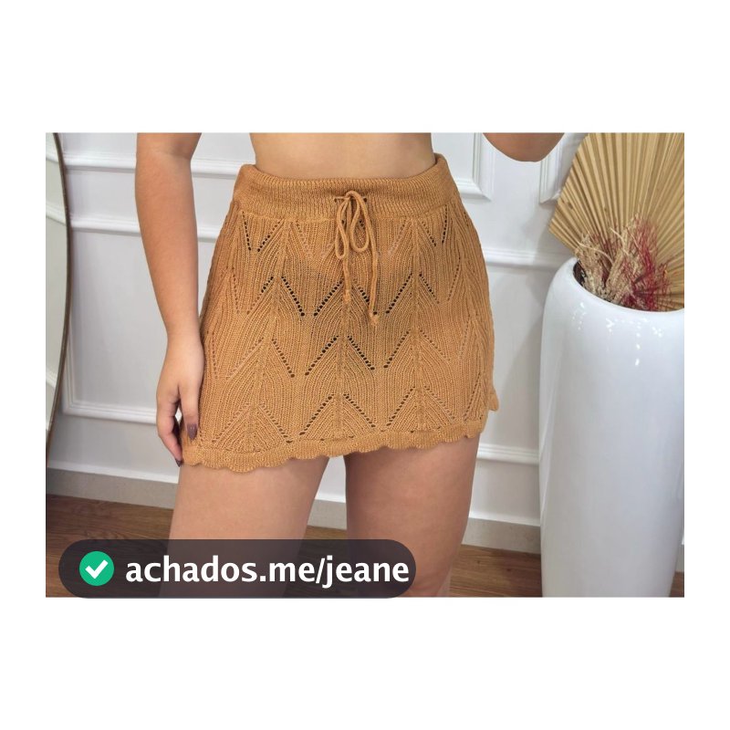 Saia Saída Praia Curta em Tricot Ponto Crochê com Cordão Ajustável Moda Verão Lançamento Tendência