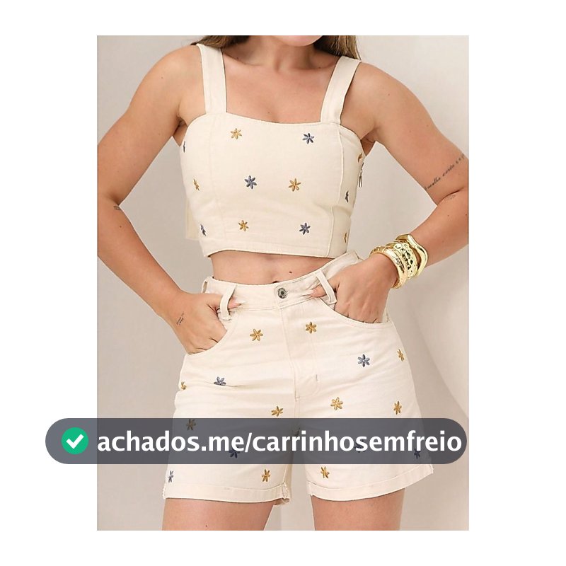 Conjunto feminino de duas peças em jeans com bordado floral sem mangas, composto por blusa cropped e shorts curtos.